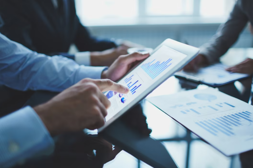 Close-up photo of businessman with digital tablet