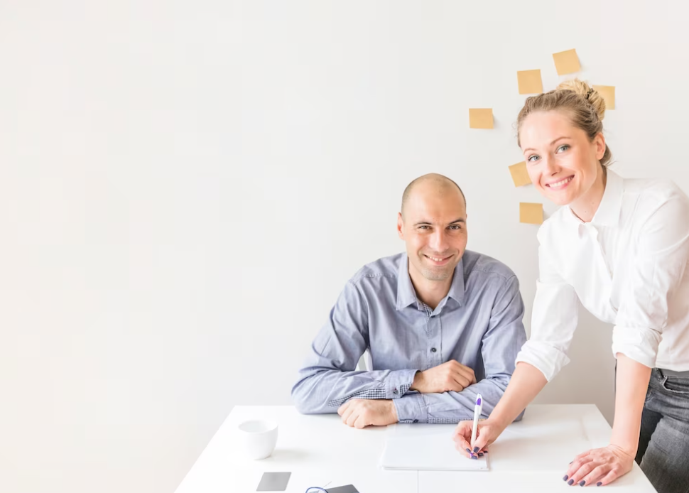 businesswoman and businessman working in the office